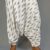 gomes white ikat pants, cotton pants brands, pangender pants, sustainable clothing brand, handmade cotton clothing, sepia stories