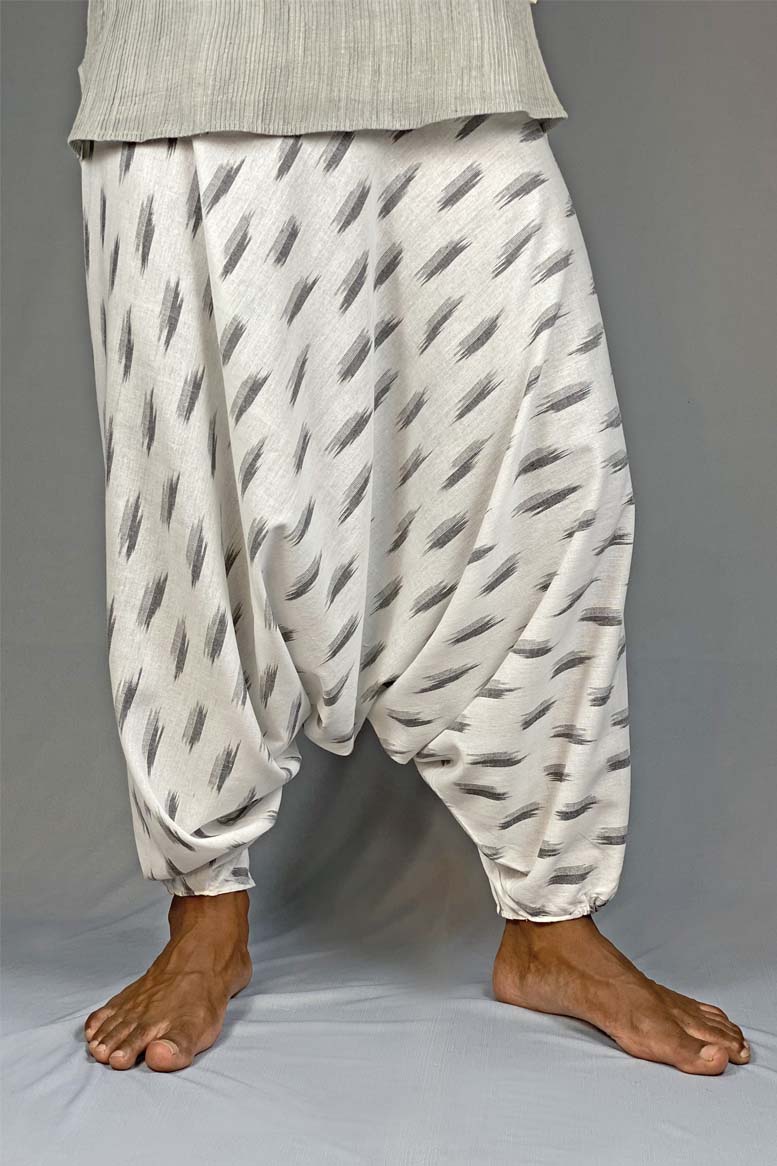 gomes white ikat pants, cotton pants brands, pangender pants, sustainable clothing brand, handmade cotton clothing, sepia stories