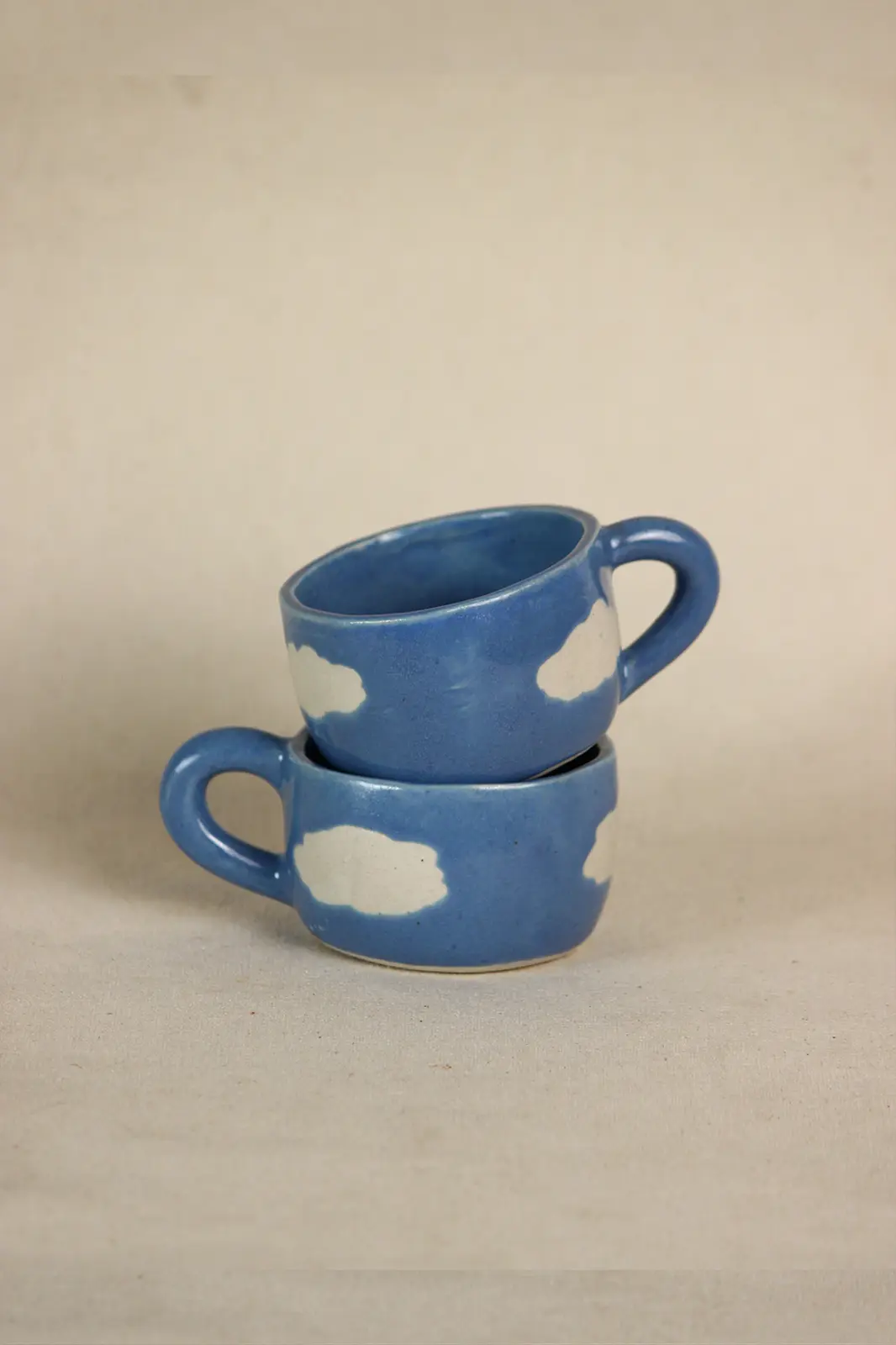 Blue ceramic dreamy cloud ceramic cup single, coffee mug, coffee mug for travelling, hand painted coffee mugs, custom hand painted coffee mugs, ceramic coffee mugs, sustainable coffee mugs, handmade coffee mugs, TOH, Sepia Stories