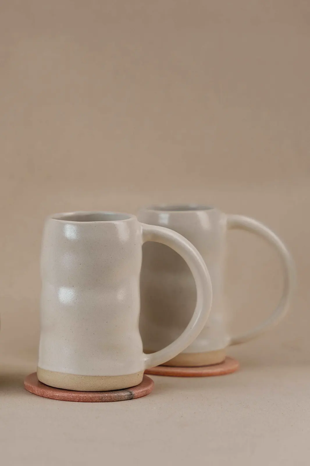 Ceramic pitcher and uneven beer mugs set matte white, beer mugs set, ceramic beer mugs, handmade pitcher, beer pitcher, funky beer mugs online India, TOH, Sepia Stories