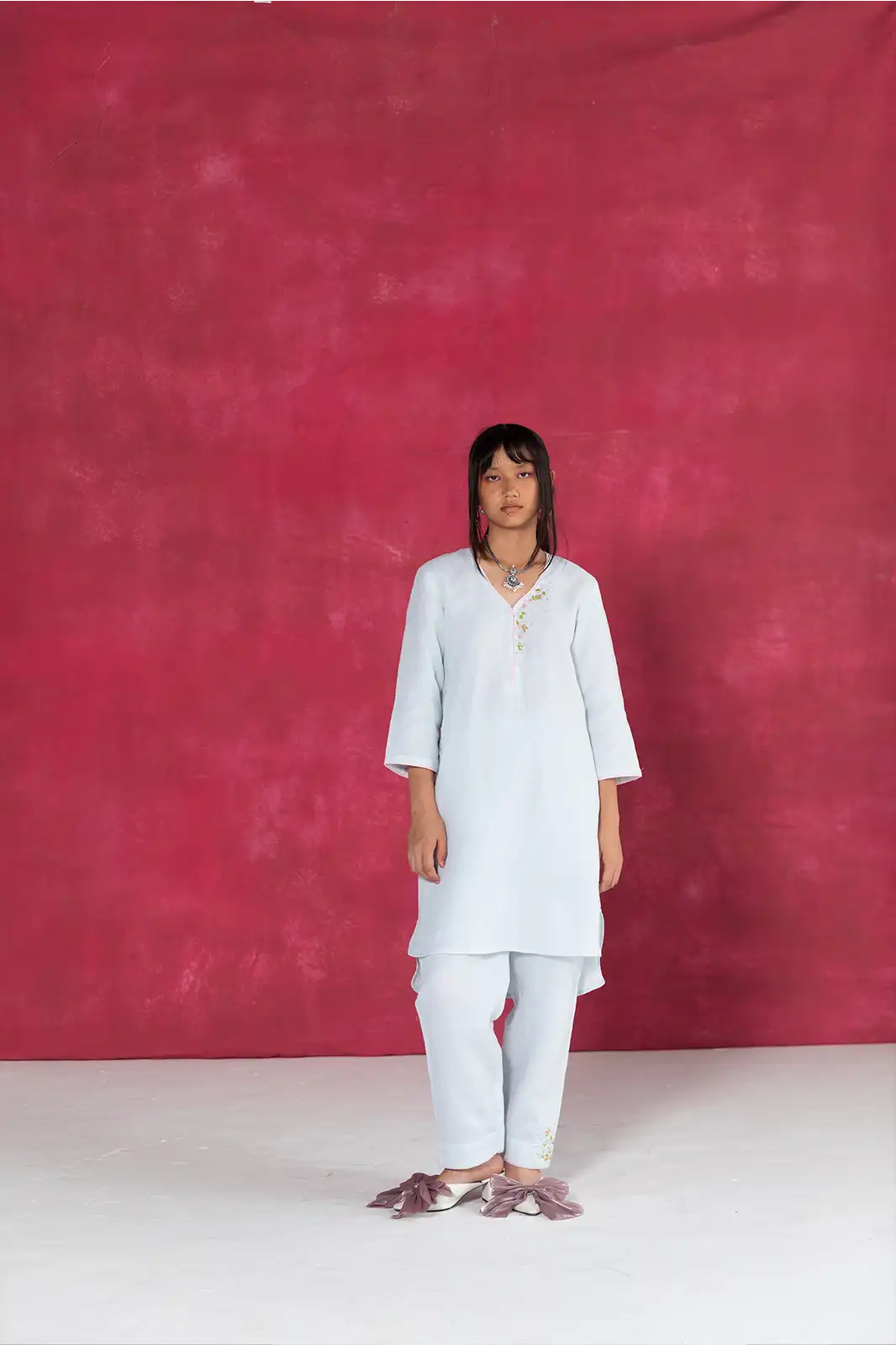 Far East Co-ord, pastel blue linen co-ord set, hand embroidered linen outfit, Sepia Stories clothing, pure linen women’s co-ord, sustainable co-ord fashion, elegant pastel blue outfit, designer linen co-ord India, artisan crafted clothing, casual linen co-ord set, breathable summer co-ord