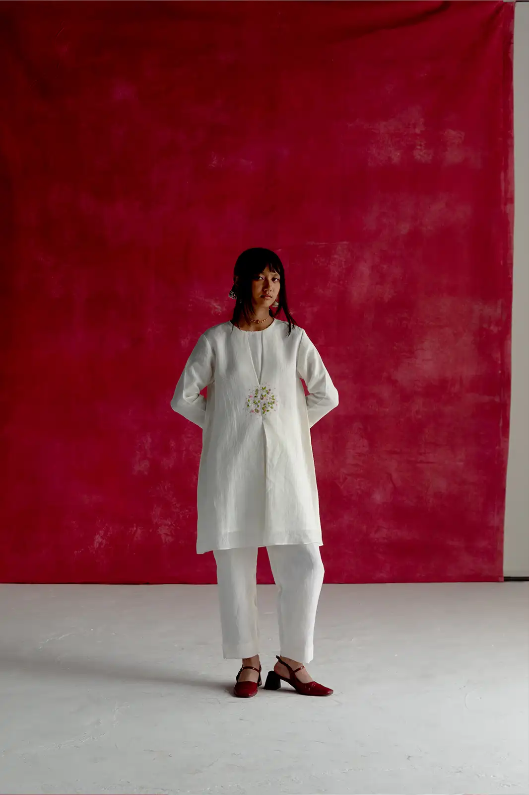 East Meets West Co-ord, ivory linen co-ord set, hand embroidered linen outfit, box pleat detail co-ord, Sepia Stories clothing, sustainable co-ord set, pure linen fashion India, designer linen co-ords, elegant ivory women’s outfit, artisan crafted linen wear, casual linen co-ord