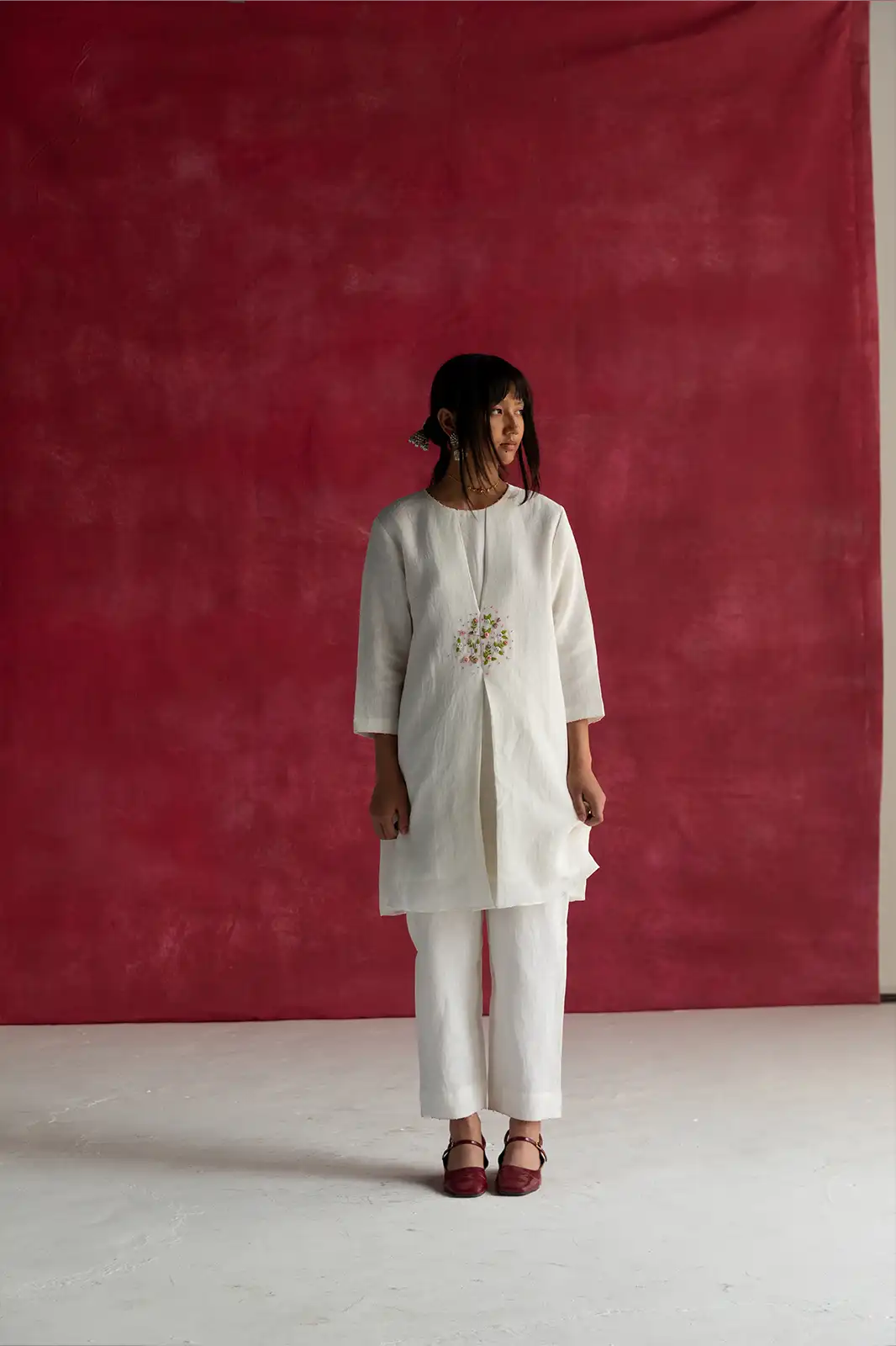 East Meets West Co-ord, ivory linen co-ord set, hand embroidered linen outfit, box pleat detail co-ord, Sepia Stories clothing, sustainable co-ord set, pure linen fashion India, designer linen co-ords, elegant ivory women’s outfit, artisan crafted linen wear, casual linen co-ord