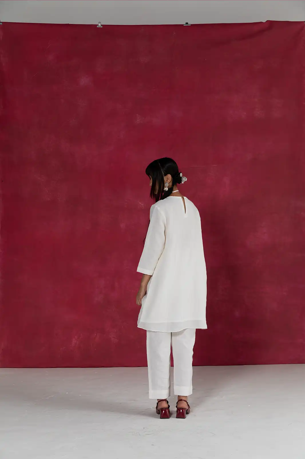 East Meets West Co-ord, ivory linen co-ord set, hand embroidered linen outfit, box pleat detail co-ord, Sepia Stories clothing, sustainable co-ord set, pure linen fashion India, designer linen co-ords, elegant ivory women’s outfit, artisan crafted linen wear, casual linen co-ord