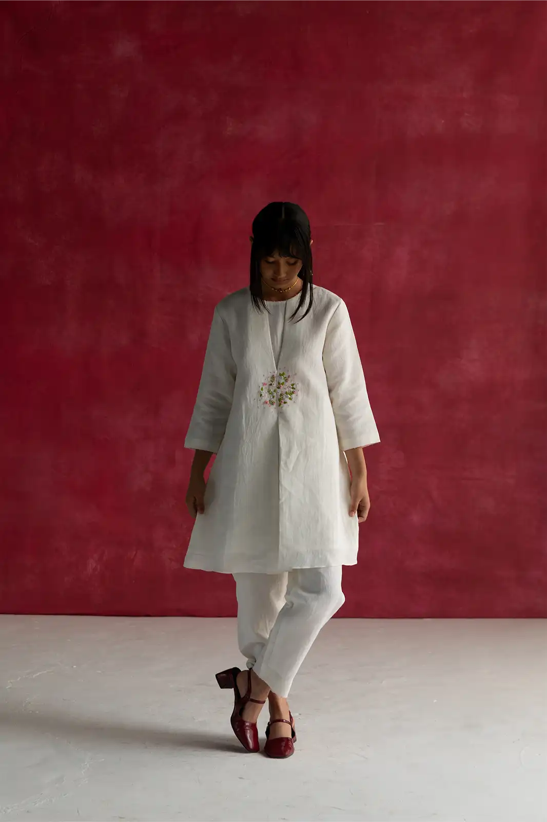 East Meets West Co-ord, ivory linen co-ord set, hand embroidered linen outfit, box pleat detail co-ord, Sepia Stories clothing, sustainable co-ord set, pure linen fashion India, designer linen co-ords, elegant ivory women’s outfit, artisan crafted linen wear, casual linen co-ord
