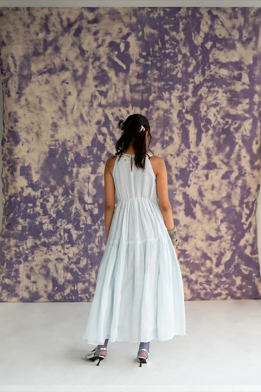 Whisper Valley Dress, pastel blue linen maxi dress, halter neck tiered dress, hand embroidered dress, Sepia Stories clothing, pure linen dress, summer maxi dress, designer maxi dress India, elegant halter dress, sustainable linen fashion, flowy linen tiered dress