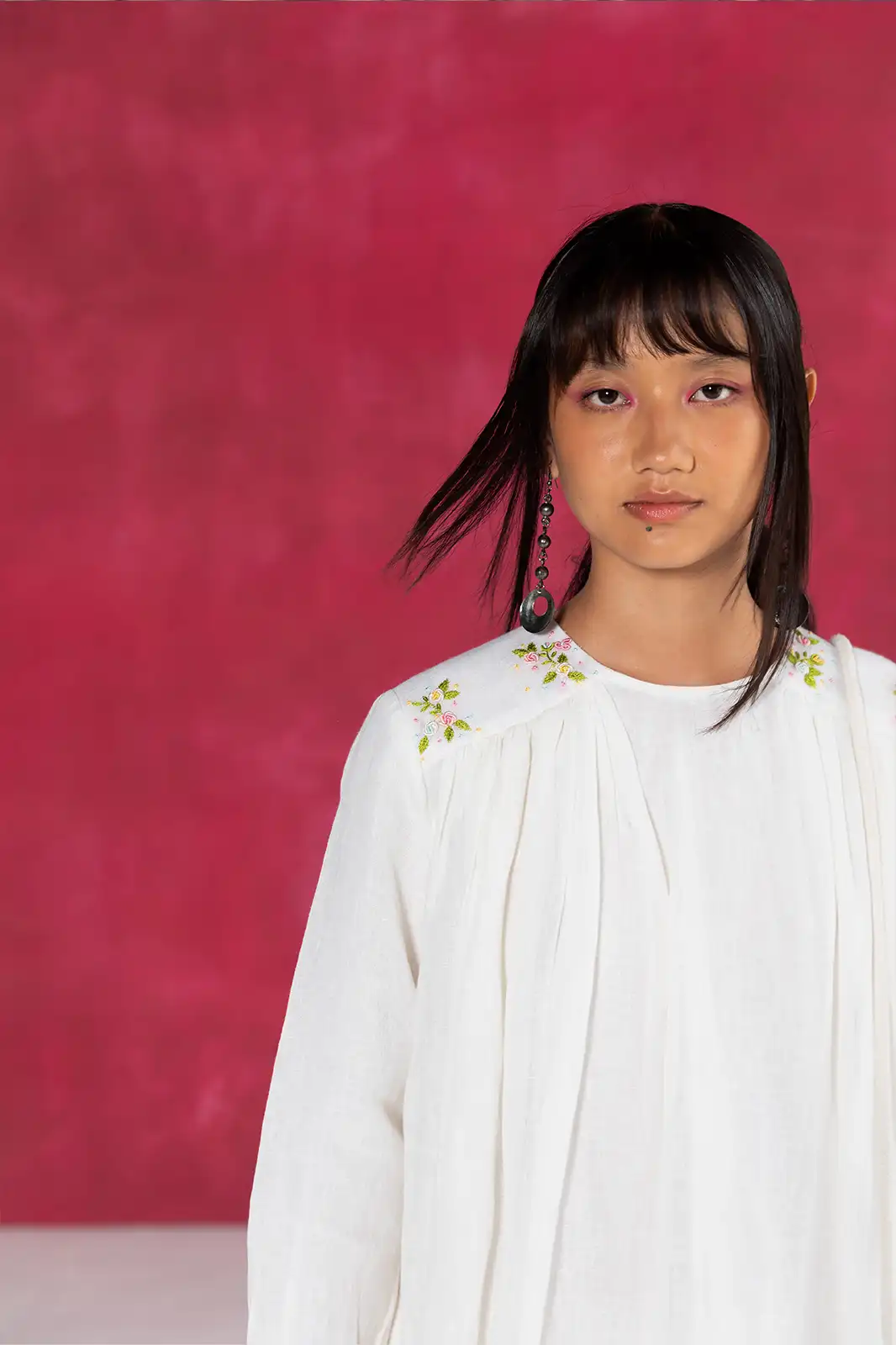 Soft Murmur Top, ivory linen women’s top, hand embroidered linen top, shoulder gathers blouse, Sepia Stories clothing, pure linen fashion, sustainable women’s wear, elegant ivory top, designer linen tops India, artisan crafted linen blouse, casual linen outfit