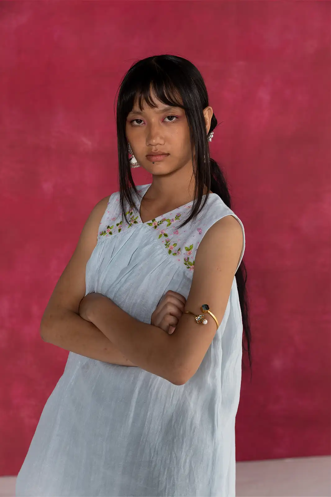 Laugh in Flowers Top, pastel blue linen top, hand embroidered linen top, empire line gathers top, Sepia Stories clothing, pure linen women’s top, sustainable fashion India, designer linen tops, elegant pastel blue blouse, casual linen wear, artisan crafted top