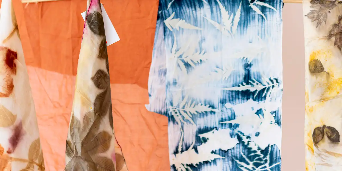 diverse fashion collection, stylish bearded man dark wavy hair pink Ikat shirt pattern hands in pockets, confident dark-haired male side profile brown Ikat shirt rooftop urban skyline outstretched arm, poised woman long dark hair wind-blown brown Ikat shirt earring accent blurred cityscape, colorful Ikat shirts display vibrant red blue green yellow hues traditional woven textile patterns, multicolor Ikat shirts collection red yellow blue green shades variety, minimalist light gray background rooftop outdoor setting, ethnic textile design cultural heritage clothing, modern traditional blend contemporary fashion concept, vibrant pattern contrast dynamic color contrast, artistic textile art creative fabric design, cultural elegance contemporary style illustration, traditional craft focus modern heritage fusion