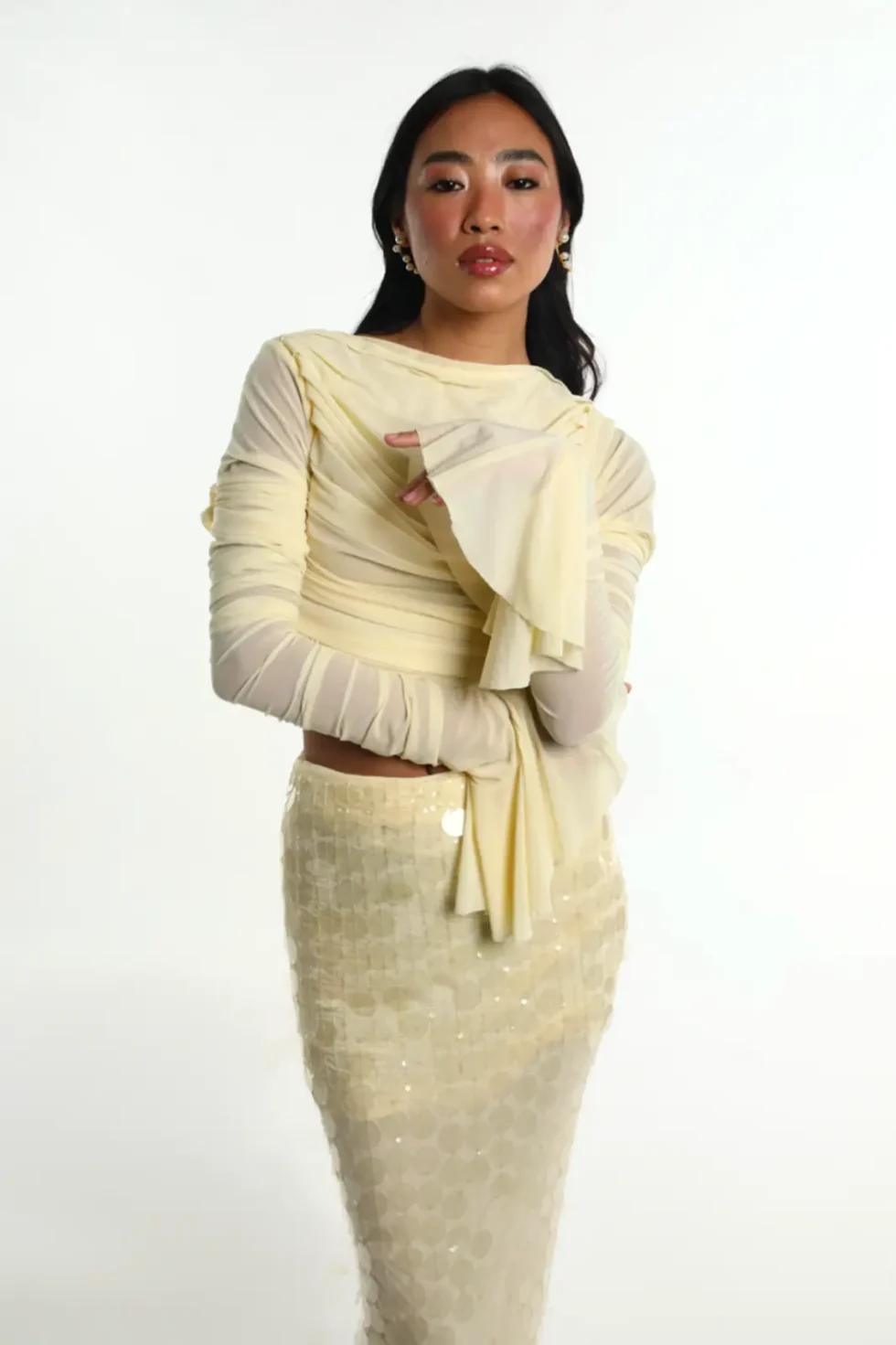 Ondina Yellow Lycra Net Top Skirt, Pastel Yellow Dress, Long Sleeve Top And Skirt Set, High Neck Dress For Women, Party Dress With Sleeves, Party Wear Long Skirts And Tops, Sepia Stories, Party Dress, Casual Long Skirts And Tops, Long Skirts And Tops For Ladies, High Neck Party Wear Dress For Women