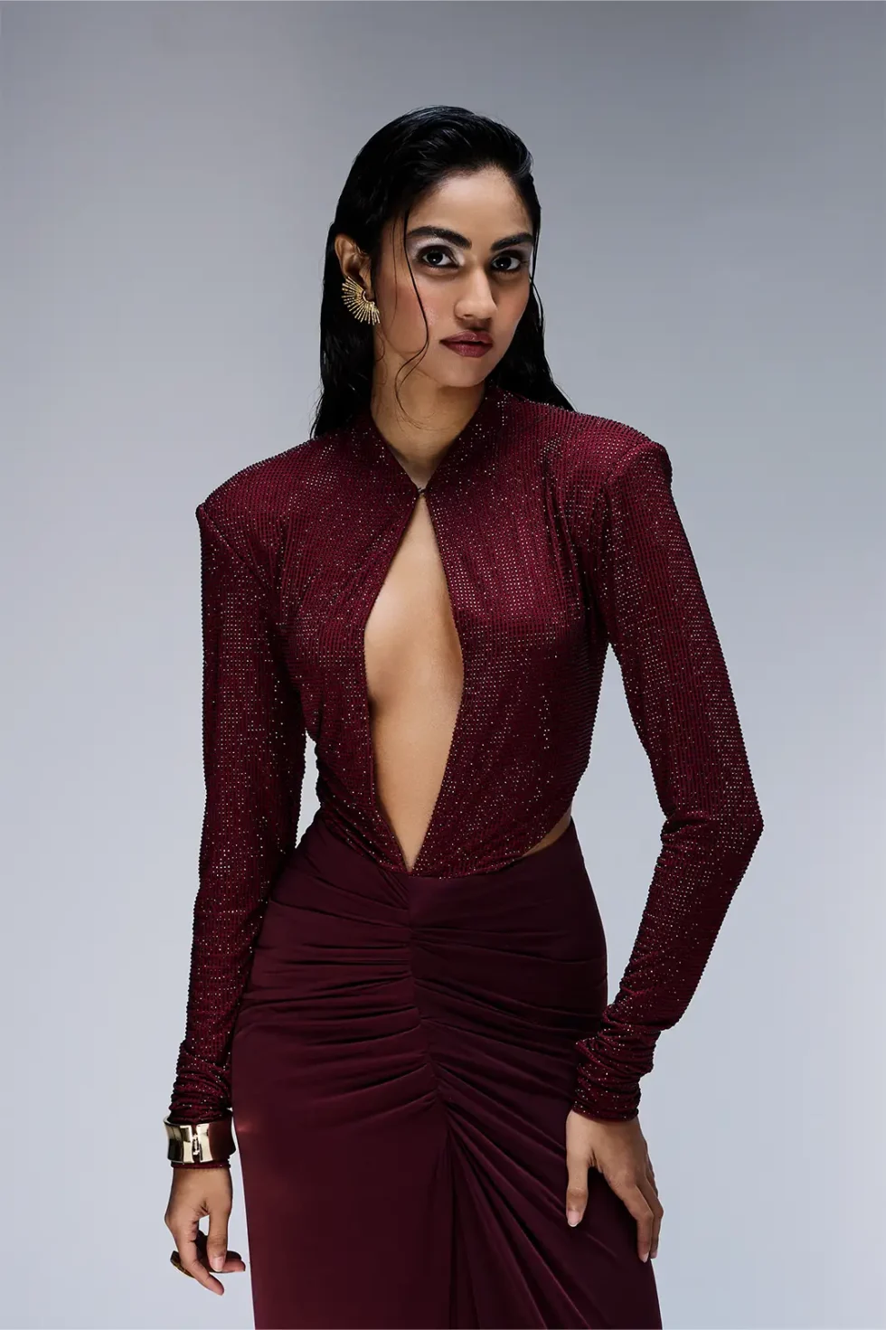 Scarlett Lycra Maroon Swarovski Dress, maroon party wear dress, Swarovski evening gown, elegant ruched dress, chic maroon outfit, luxury lycra gown, sophisticated cocktail wear, stylish Swarovski dress, designer maroon attire, fashionable evening outfit, keyhole neckline dress, glamorous party wear, premium maroon gown, statement Swarovski dress, modern elegant outfit