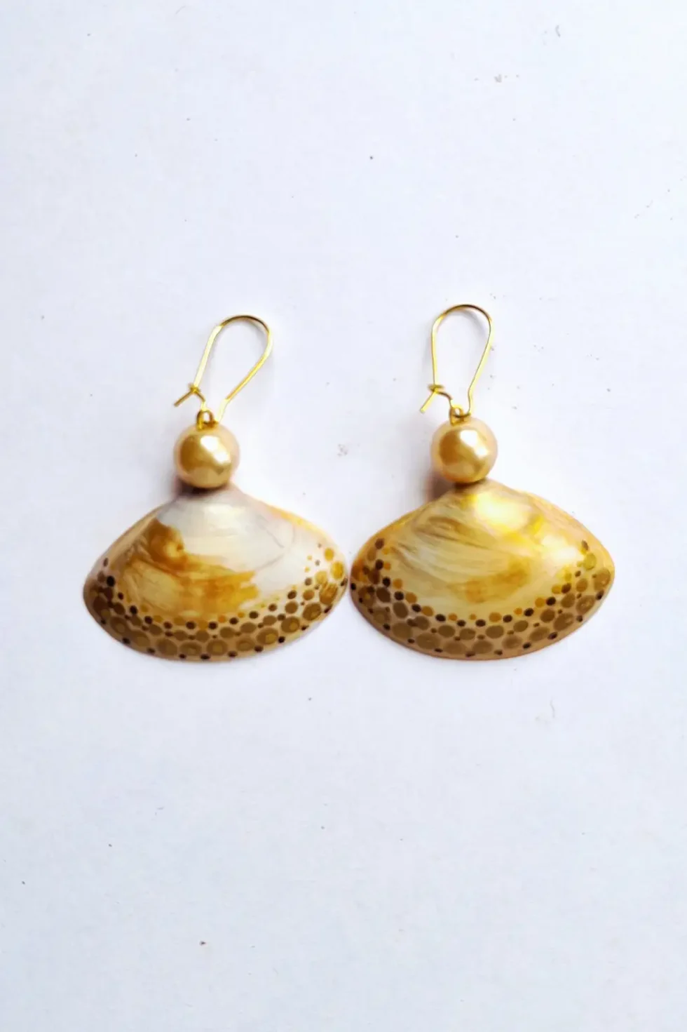 JOA Gold Border Dotted 1 Small Hand Painted Earrings, Sea Shell Earrings, Handcrafted Earrings, Artistic Earrings, Sustainable Jewellery, Goa Earrings, Hand Painted Earrings, Hand Painted Earrings Jewelry, Shell Earrings, Sustainable Jewellery, Sepia Stories, Jack Of All,