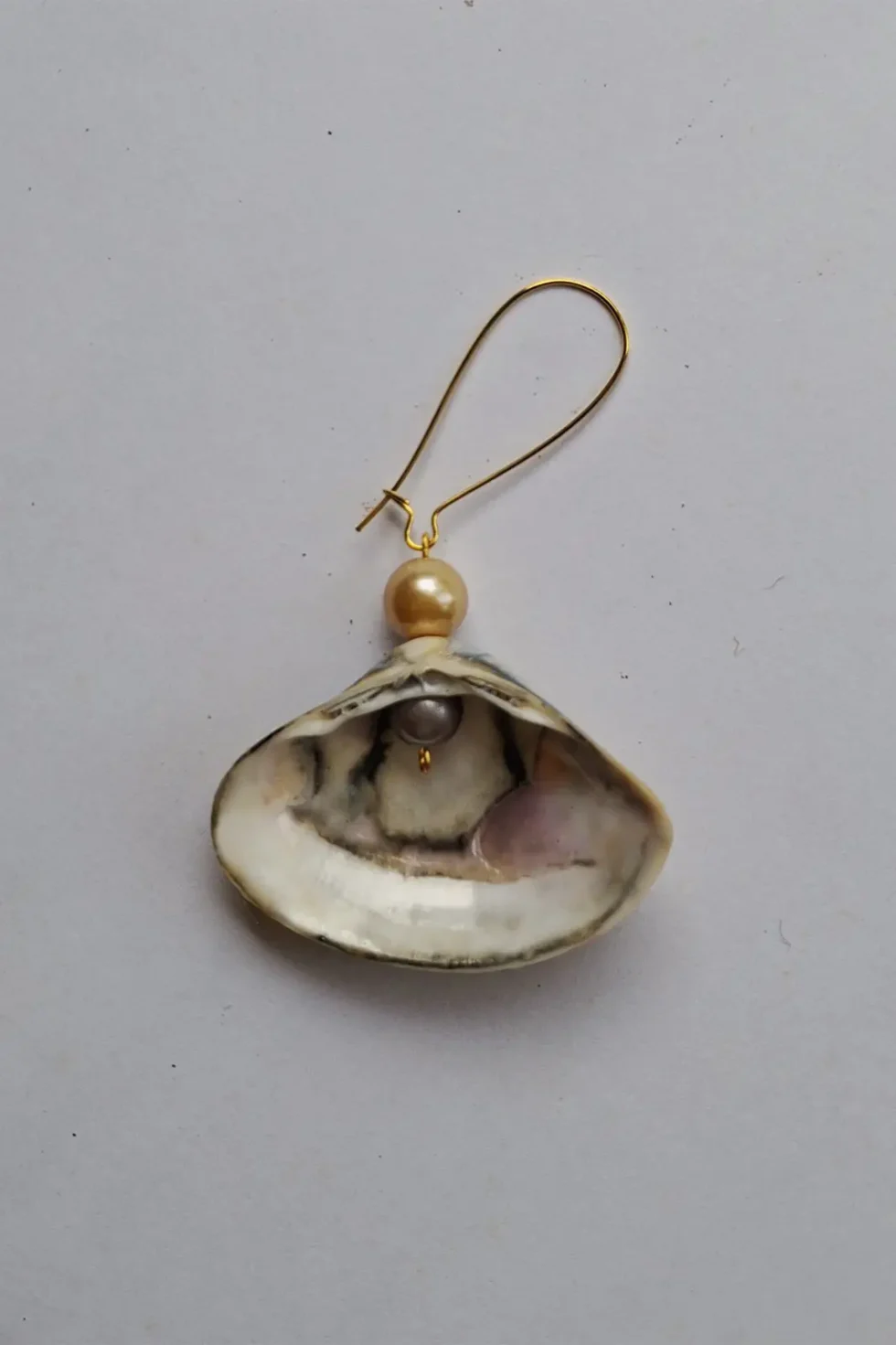 JOA Long Hoop Gold Border Dotted Sea Shell Earrings, Goa Earrings, Handcrafted Earrings, Handcrafted Earrings For Women, Hand Painted Earrings, Sepia Stories, Jack Of All, Themed Earrings, Casual Earrings, Sustainable Jewelry, Gold Earring